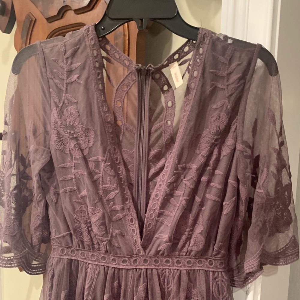 Gorgeous charcoal gray romper. Lace detailing.